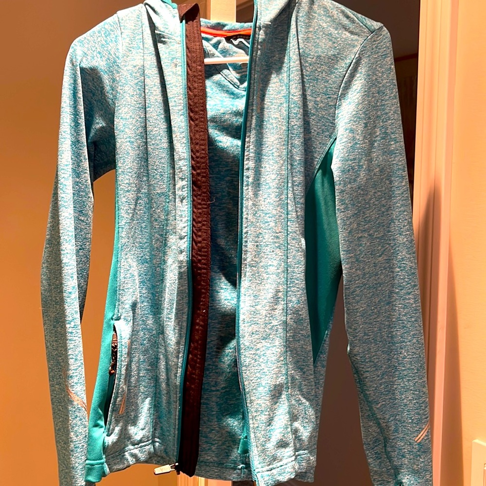 Brooks women’s running jacket with hood.